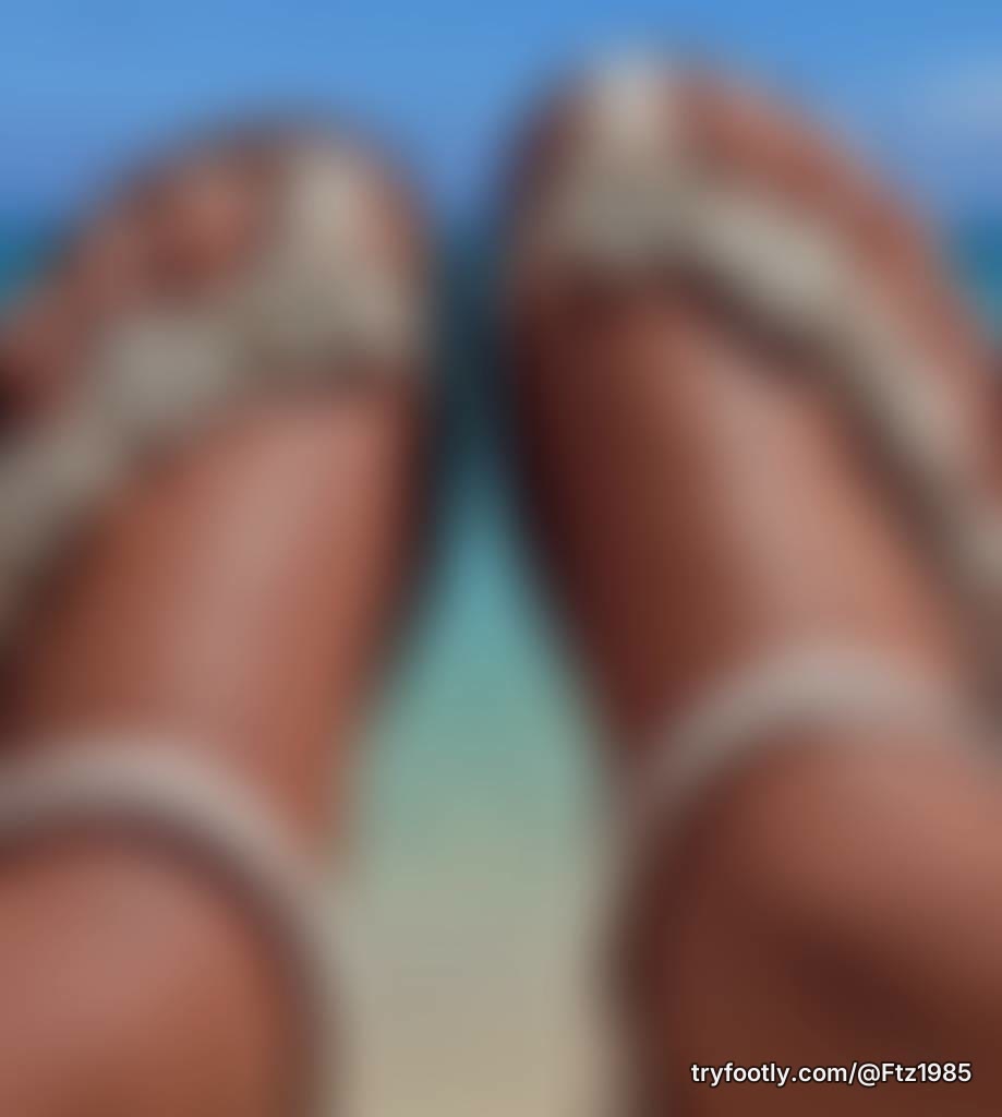 Beautiful feet in pretty sandals