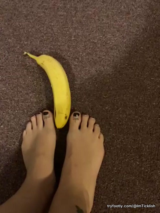 Attempting to peel a banana