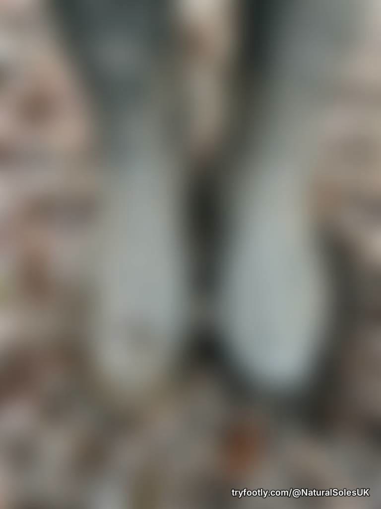 Hello, I’m new. Lovely feet inside those boots