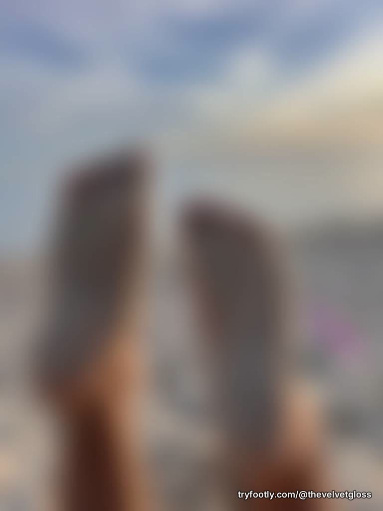 The sand stuck to my toes and soles like a crumble donut. Close ups of the bottoms of my f