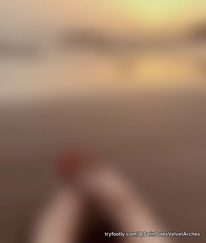 Sandy toes and painted nails