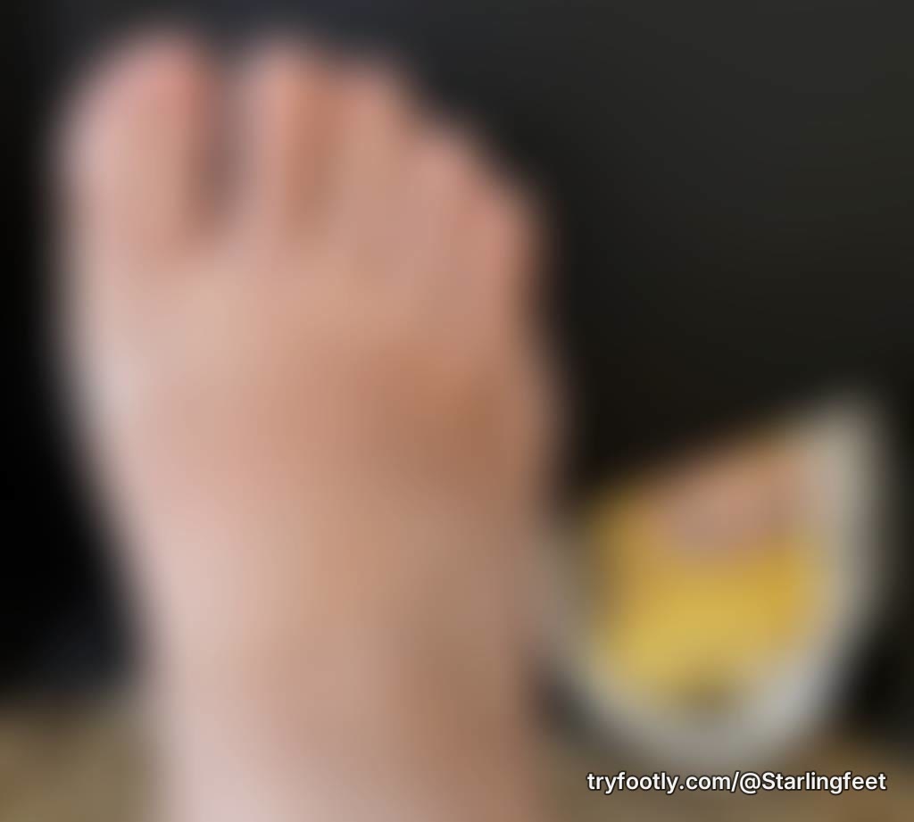 Peekaboo. Checking out my dirty feet after a long day.