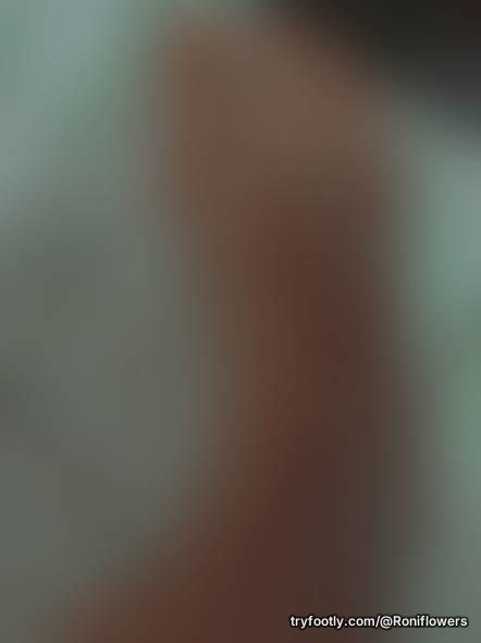 Today’s little treat is waiting behind the curtain… Smooth, bare feet gently covered in oi