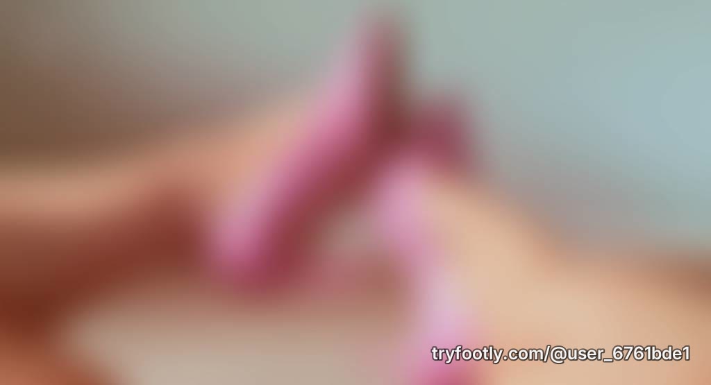 Pink high heels, soles, dangling…. Who wants more???