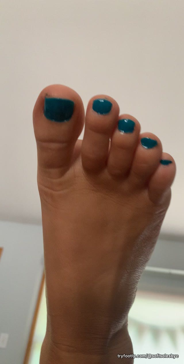 Close-up of one foot with a fresh pedicure🩵