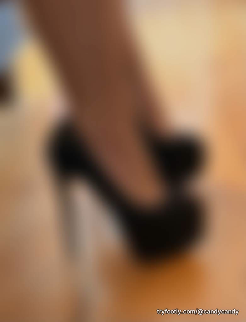 Black heels • Red nails