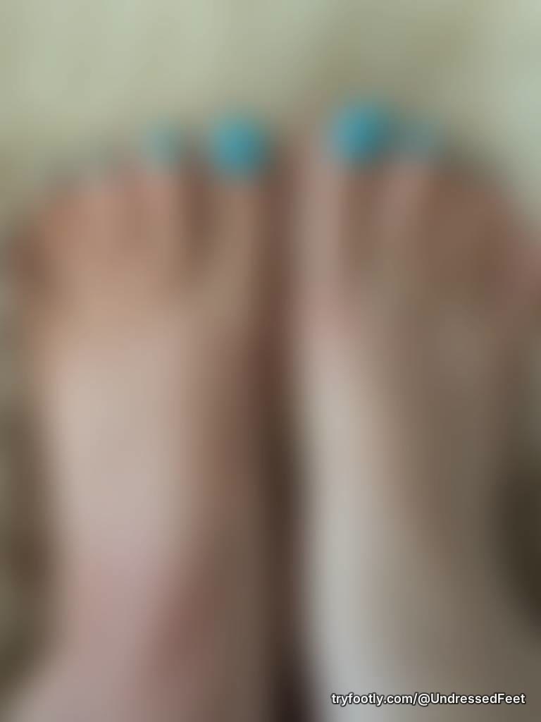 Bare feet on a sheep skin rug