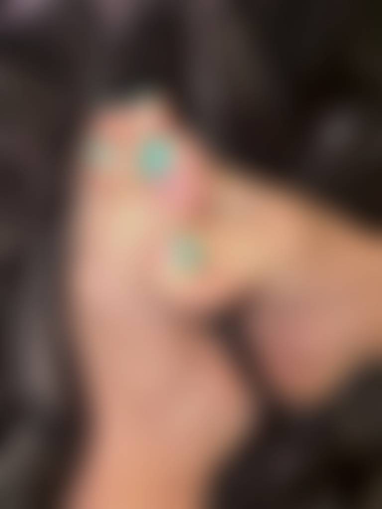 Entangled Toes in satin sheets 💚🖤