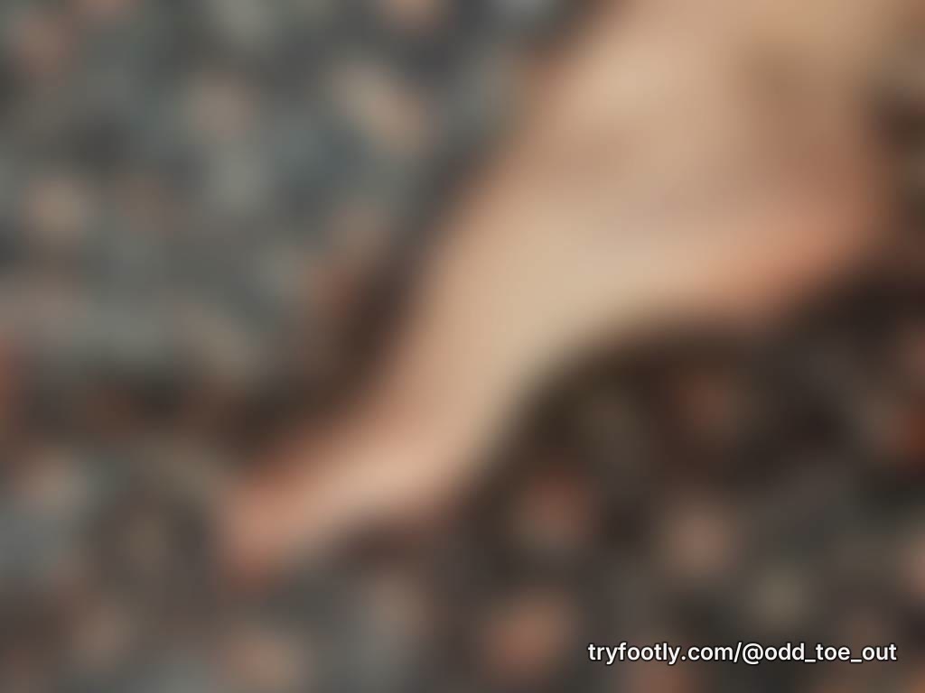 Fresh out of the shower, squeaky clean, pink soles. And can you see the cute little freckl