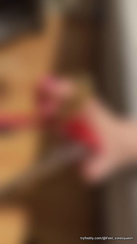 Letting this sexy stiletto hang from my pretty pink toes. Want to see it?