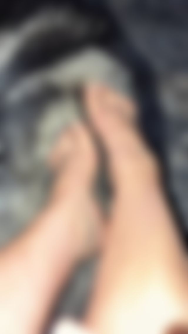 Just a girl her feet and a husky