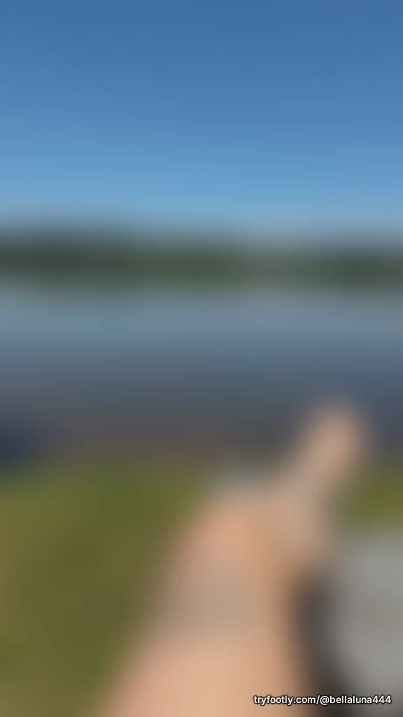 Laying out by the lake. Who would give me a little rub?