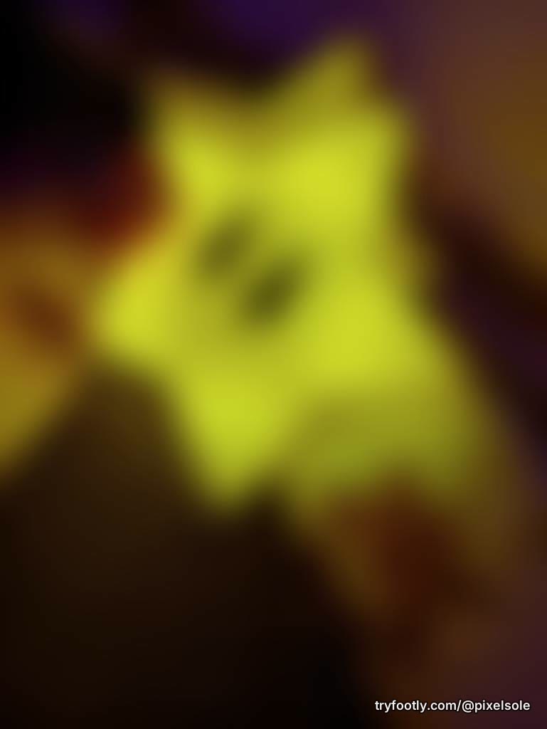 Charging up on a real life Mario star ⭐💛 Bare feet. Yellow glow. Gengar watching. 👻💜 Are y